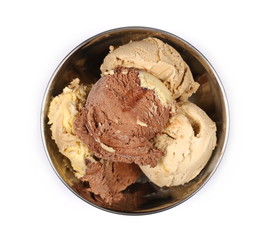Chocolate, vanilla and caramel ice cream in metal bowl isolated on white background, top view