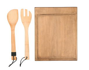 Wooden board and utensils on white background