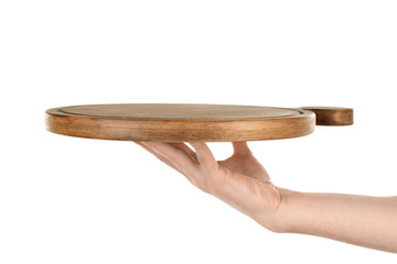 Female hand holding wooden board on white background