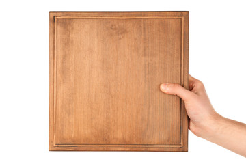 Female hand holding wooden board on white background