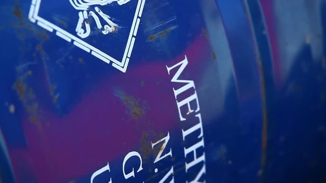 White Warning Sign with Skull and Methanol danger sign and methanol special marks at blue can