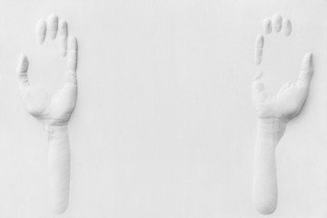 Gypsum hands offering something