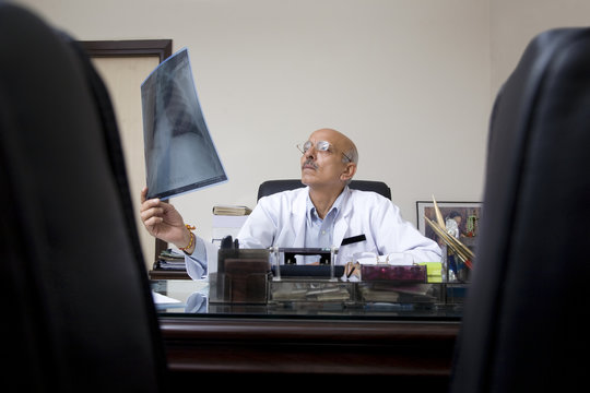 Doctor looking at an X-ray 