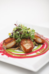 Plated seared sea scallops