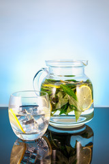 non-alcoholic Mojito in a glass decanter