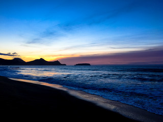Fototapeta premium Sunrise over the Atlantic Ocean from the beach at Vila Baleira, Porto Santo, Portugal