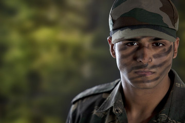 Portrait of a soldier in military uniform 