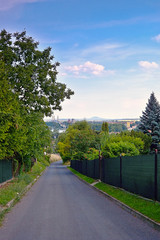 Lovosice, Czech republic - July 05, 2017: asphalt path in Lovosska street  leading from Lovos hill to Lovosice city in PLA Czech central mountains