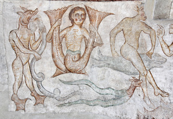 sirena e mostri marini; affresco romanico nella chiesa di San Giacomo a Termeno
