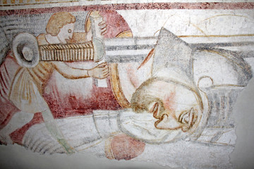 Davide decapita Golia; affresco romanico nella chiesa di San Giacomo a Termeno