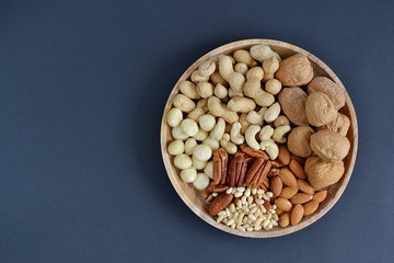 Assorted Mixed Nuts Peanuts Almonds Pecan Cashew Hazelnuts Macadamia Pine Black Background Healthy Concept