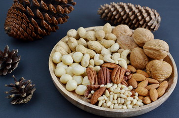 Assorted Mixed Nuts Peanuts Almonds Pecan Cashew Hazelnuts Macadamia Pine Black Background Healthy Concept
