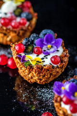 Dessert with sunflower seeds, yogurt and fresh berries © FoodAndPhoto