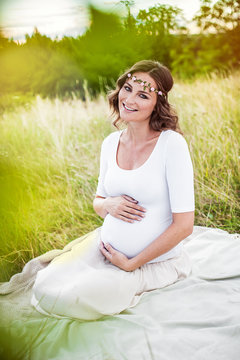 Beautiful young pregnant woman (retouched)