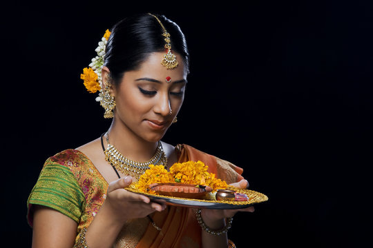 Indian woman performing puja 