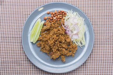 Crispy catfish salad with green mango