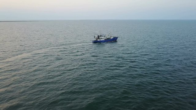 Fishing boat in the sea. aerial survey