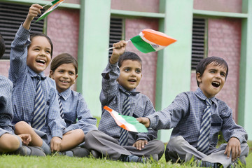 School kids holding the Indian flag 