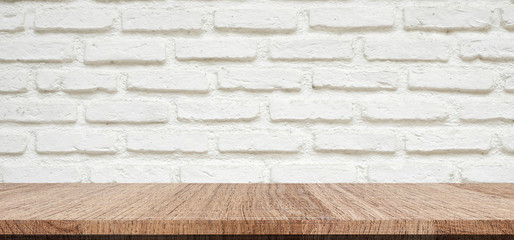 Empty wood table over white brick wall background, product montage display background