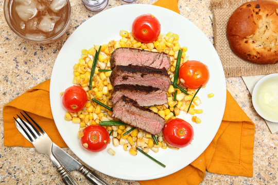Pan-Seared Steak with Cherry Tomato and Corn Salad