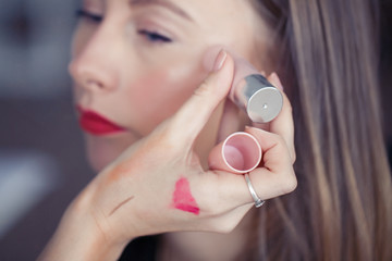 Hand of makeup artist