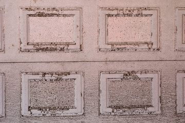 Grungy and dirty pink wooden door texture