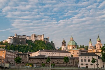 Naklejka premium Salzburg town with church and fortress on the mountain.