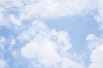 Fantastic soft white clouds against blue sky background