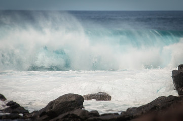 Tilt shift effect of oceanic waves making lather against the Boca de Abaco rocks coast, Lanzarote,...