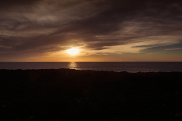 Naklejka na ściany i meble Sunset on Lanzarote coast