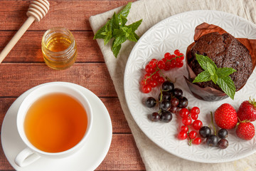 Chocolate cupcakes with summer berries.