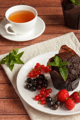 Chocolate cupcakes with summer berries.