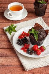 Chocolate cupcakes with summer berries.
