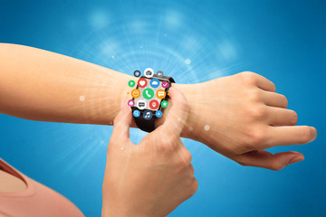 Smartwatch with application icons.
