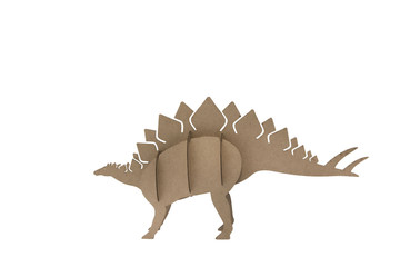 Stegosaurus made out of cardboard. paper dinosaur toy isolated on white background