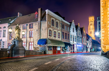 Fototapeta na wymiar View from the Rozenhoedkaai in Brugge with the Perez de Malvenda house and Belfort van Brugge in the background at night.