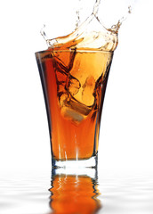 soft drink with a splash isolated on white