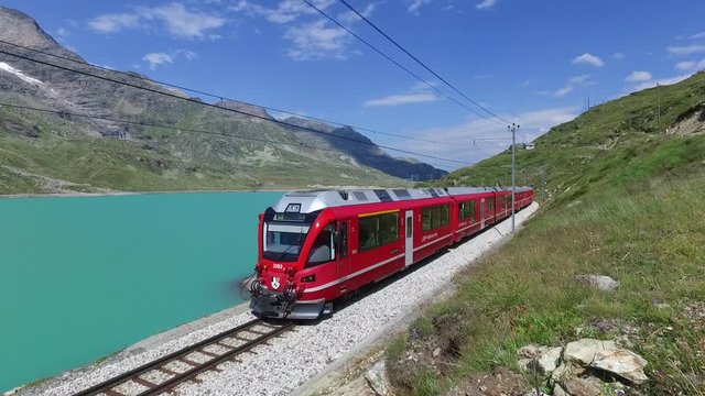 Bernina Express - Red train on Bernina Lake