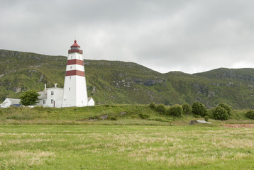 Fototapeta na wymiar Lighthouse at Alnes at Godoya island