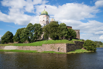 Fototapeta na wymiar View of the tower of St. Olaf on a sunny summer day. Vyborg Castle