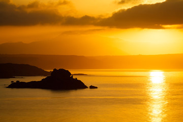 Fototapeta na wymiar Beautiful sunrise above the Kefalos bay in Kos island, Greece.