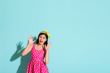 beautiful girl wearing a dotted pink cute dress