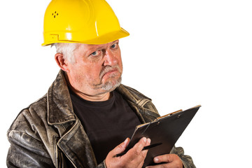 Portrait of a construction manager, he looks very skeptical