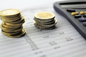 An business image with money and calculator