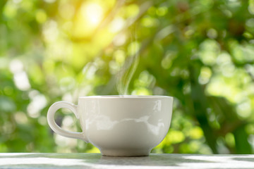 White coffee cup in the morning time