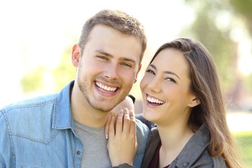 Couple posing with perfect smile and white teeth