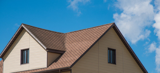 house with a gable roof window