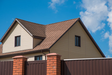 house with a gable roof window