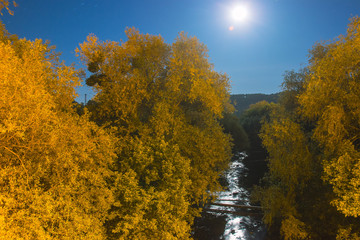 Fototapeta premium silhouette of bridge with moon