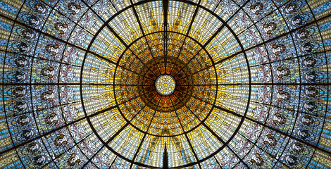 Palau de la Musica Catalana skylight of stained glass designed by Antoni Rigalt i Blanch whose centerpiece is an inverted dome in shades of gold, Barcelona, Spain. - obrazy, fototapety, plakaty